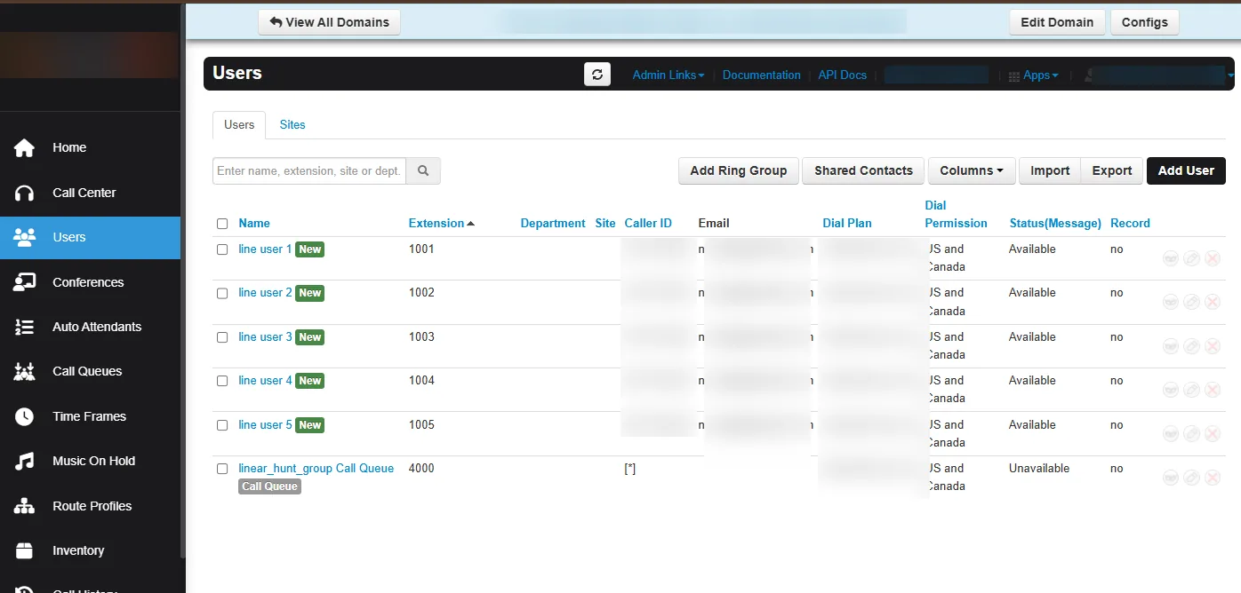 NetSapiens Users list for the newly created domain, with the domain/company name, caller ID, and dial-plan domain blurred